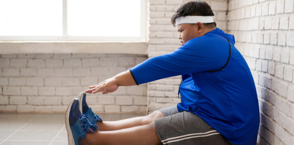 Fat man exercise in the house